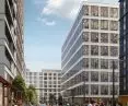The entire area will be devoid of curbs and posts, and diverse greenery will appear along the street.
