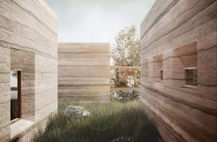 Masywna, zwarta forma części wspólnych została uzyskana dzięki zastosowaniu technologii rammed earth