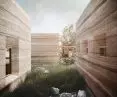 The massive, compact form of the common areas has been achieved through the use of rammed earth technology