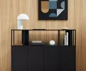 Stepps bookcase supported by base cabinets