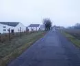 The road where the house stands