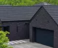 In 2026, roof color is no longer an add-on - it's one of the main languages that architecture speaks