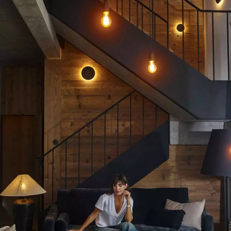 The interiors of the house are built from materials with a distinct natural texture