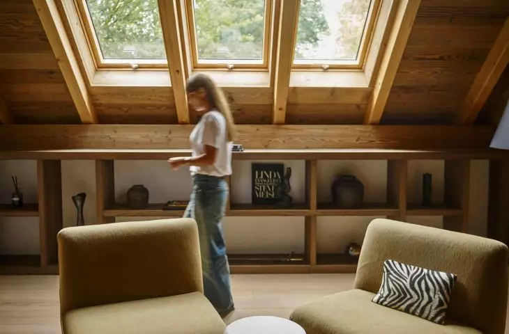 The color palette is based on earthy colors: muted beiges, warm grays and shades of brown