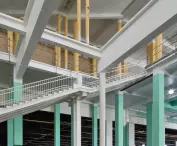 The spatial layout of the Palais des Expositions is based on a vast central hall around which are arranged wings of varying heights and functions
