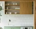 The kitchen is dominated by calm colors