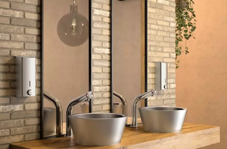 TEMPOMIX 3 time mixer and ALGUI washbasin and stainless steel soap dispenser from DELABIE