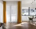 The dining room is connected to the living room