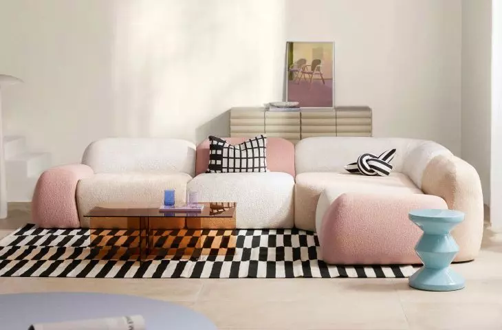 The interiors are characterized by a calm color base, complemented by distinctive graphic accents