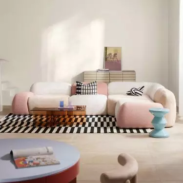 The interiors are characterized by a calm color base, complemented by distinctive graphic accents