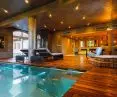 Swimming pool with hidden overflow