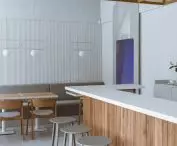 Neon-lit corridor leads to toilets
