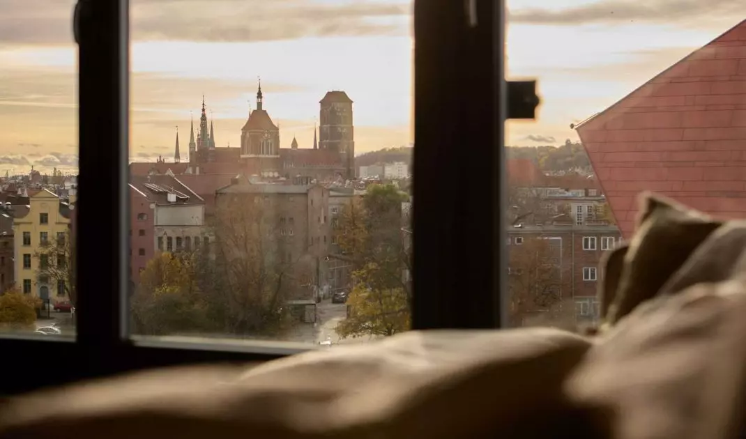 The 88-square-meter apartment, located in the center of Gdansk, was designed to make the most of its location.