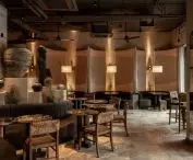 ULU in Gdansk; larger groups can sit in grotto-like symmetrical alcoves with arched seats