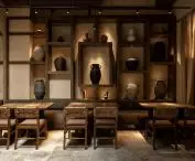 bookcase with ceramic vases