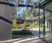 the curved line of the house in the lower part is almost entirely glazed