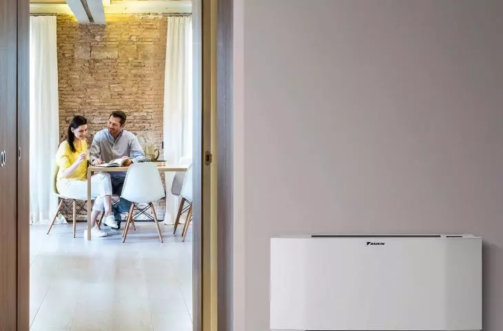 Indoor baseboard unit for heat pump