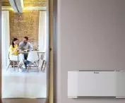 Indoor baseboard unit for heat pump