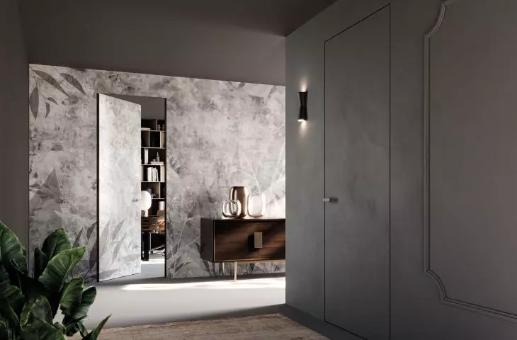 Battente 45 concealed door, textured plaster wallpaper