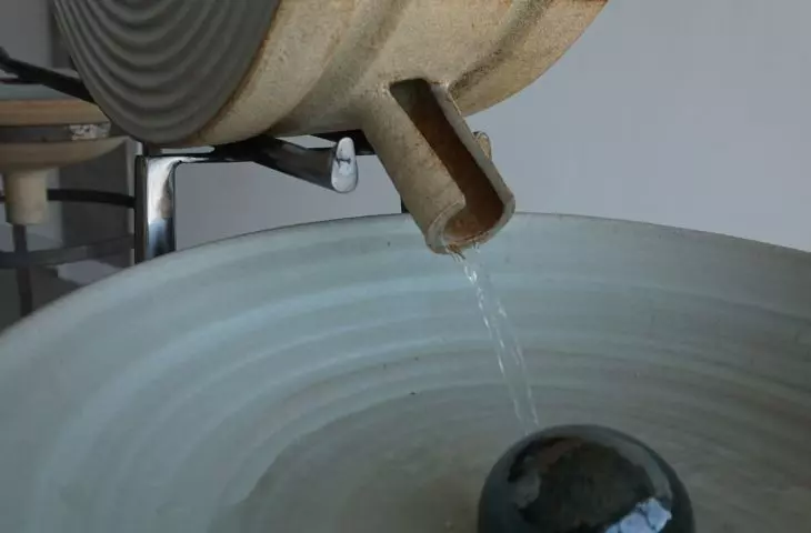 The vessels are turned on a potter's wheel