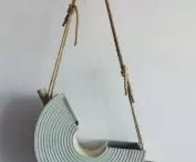 A suspended washbasin can function as a shower