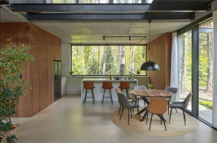view from the lounge area to the kitchen and dining room