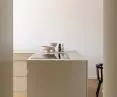 View of the kitchen island from the hallway