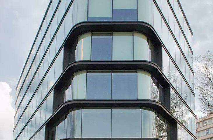 Aluprof aluminum joinery , spatial aluminum flashings, ventilated facade with aluminum cassettes and fiber-cement panels