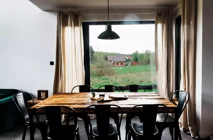 Around the table made of old boards