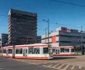 Lodz streetcar 11A on the background of the Central and PSS 
