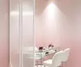 Nordic-style metal partitions with white grooved glass for a beauty salon