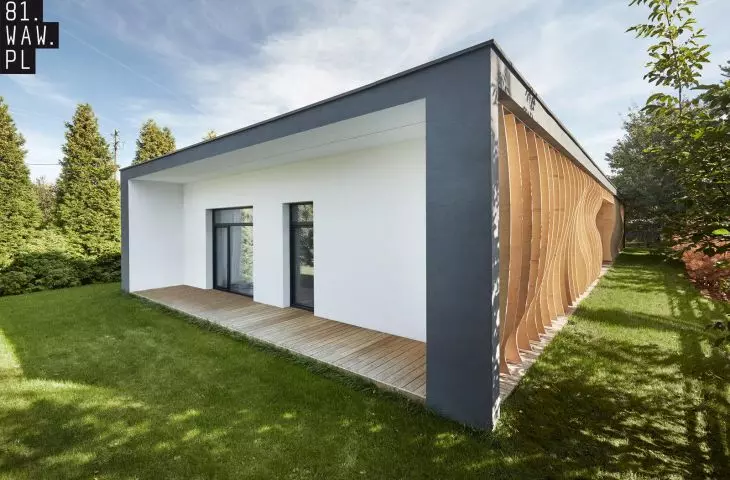 thanks to large glazing, residents can easily move from the living room to the spacious garden