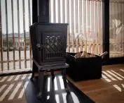 A small fireplace provides warmth in the house 