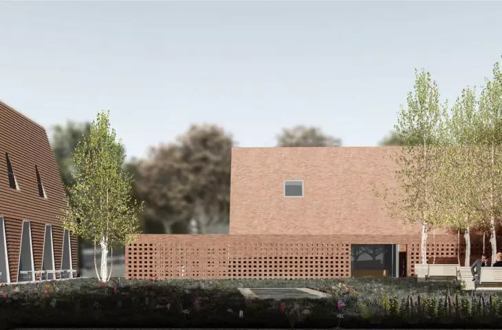 nagrodzony kompleks złożony jest z dwóch pawilonów z okładziną z płaskiej dachówki ceramicznej i cegły