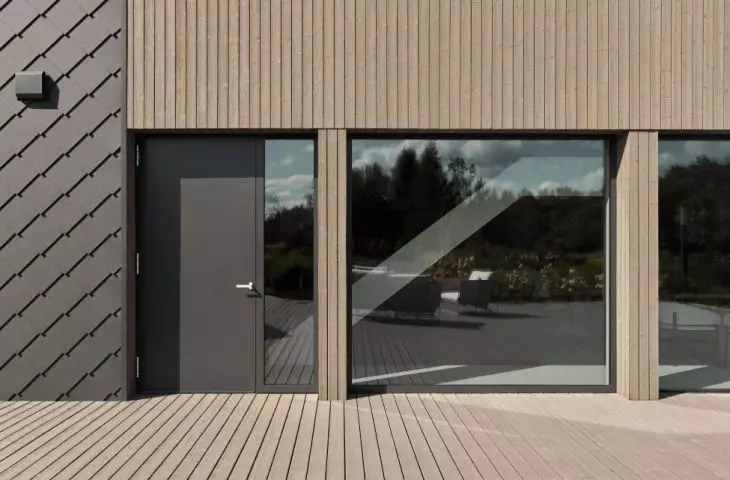 Key design elements include neutral, earthy tones, natural textures, and large windows.