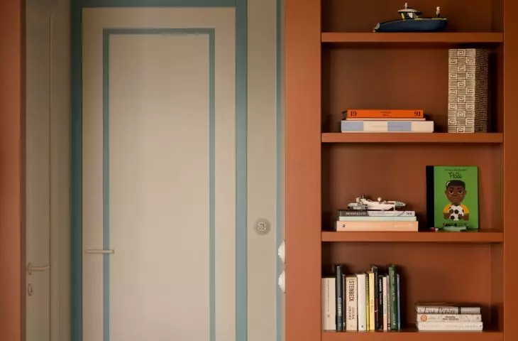 An open bookshelf shows that functional built-in furniture can be one of the strongest elements of an interior