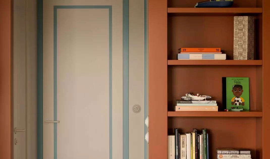 An open bookshelf shows that functional built-in furniture can be one of the strongest elements of an interior