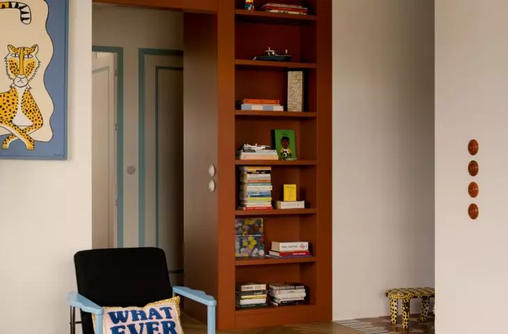 Warm wood, soft fabrics, and graphic details make the interior bold yet very cozy