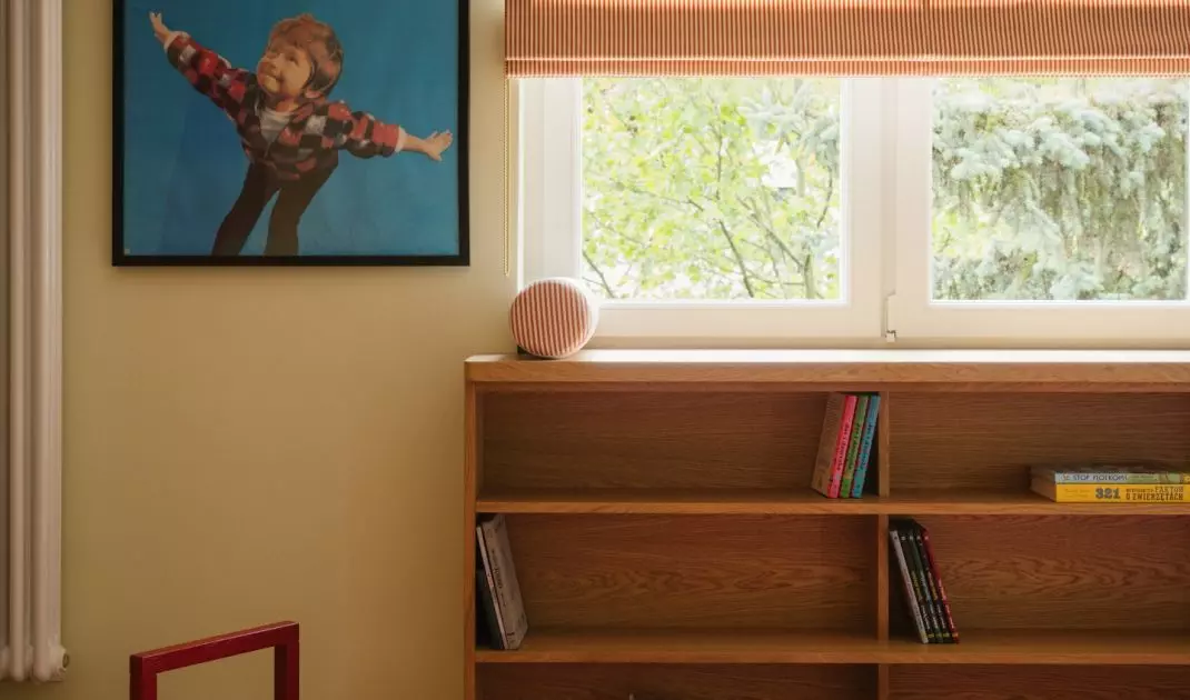 The children's room has space for toys, books, and everyday items, which will change over time along with the family members