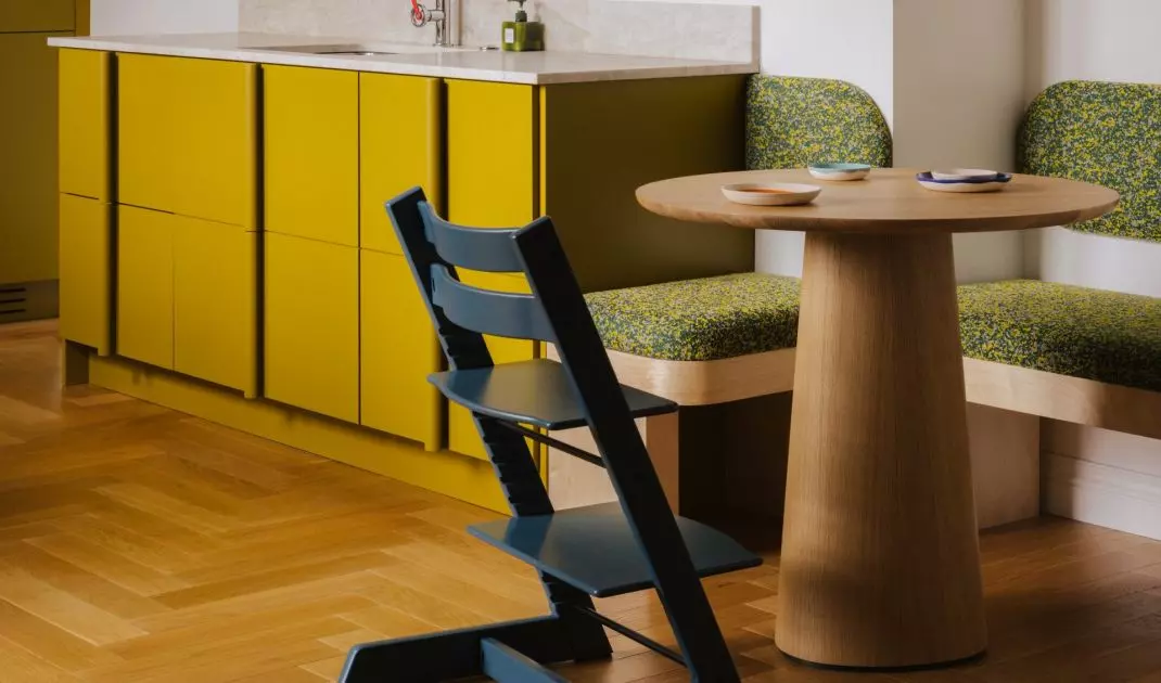 The kitchen also features a small breakfast nook. It’s the perfect spot for a quick morning meal, a chat over coffee, and daily family rituals