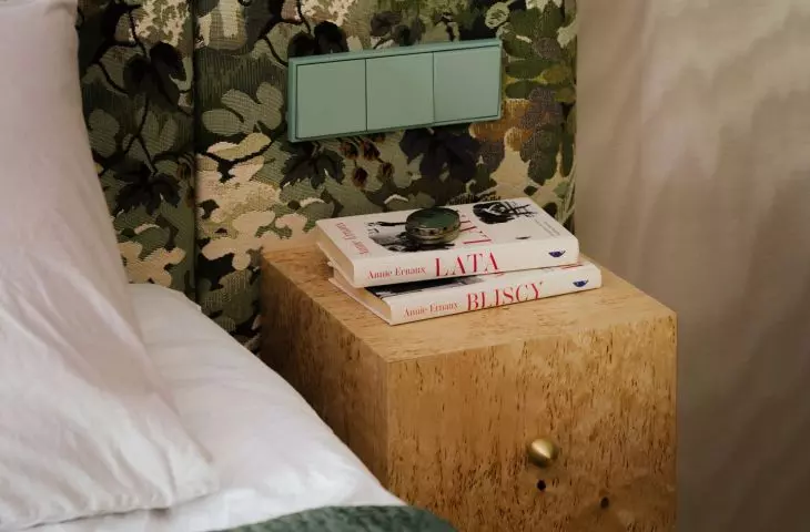 It's not just colors that give an apartment its personal character—books, small objects, and the textures of fabrics do too
