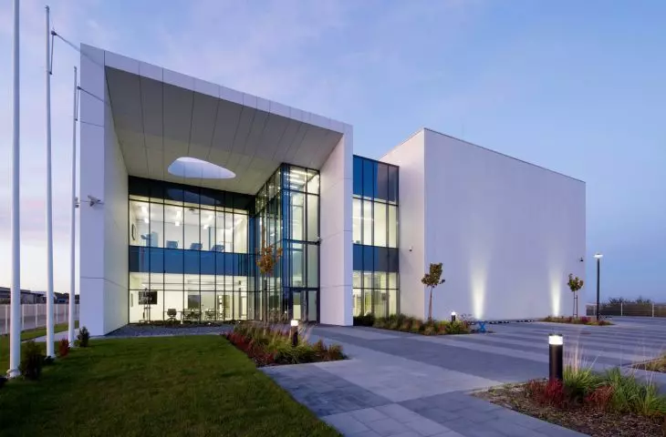 The center is formed by a two-story office building and an exhibition and laboratory hall