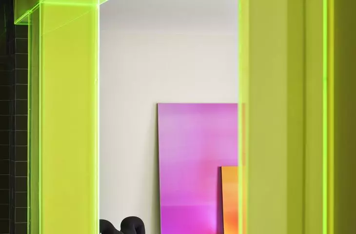 The translucent acrylic filters the light and makes the interior appear different depending on the viewing angle