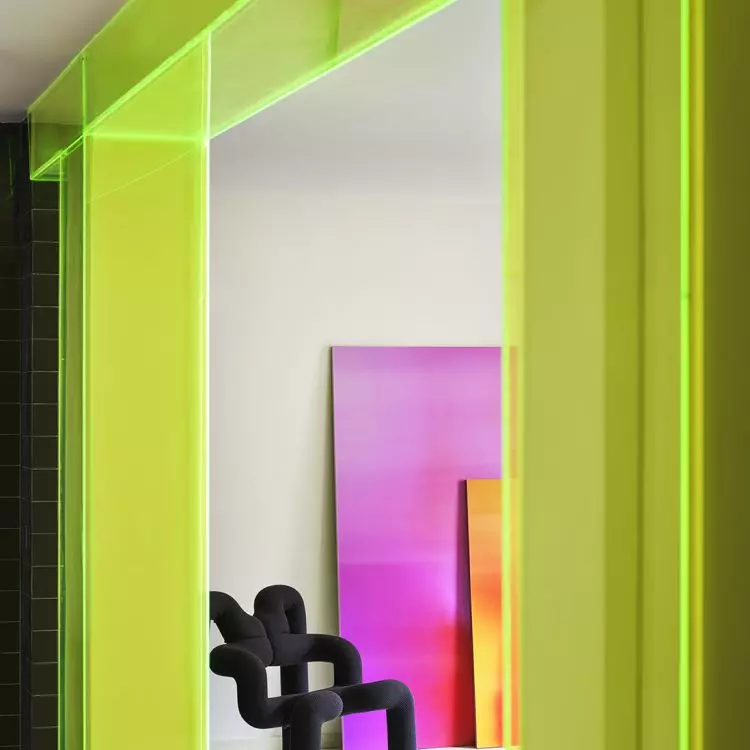 The translucent acrylic filters the light and makes the interior appear different depending on the viewing angle