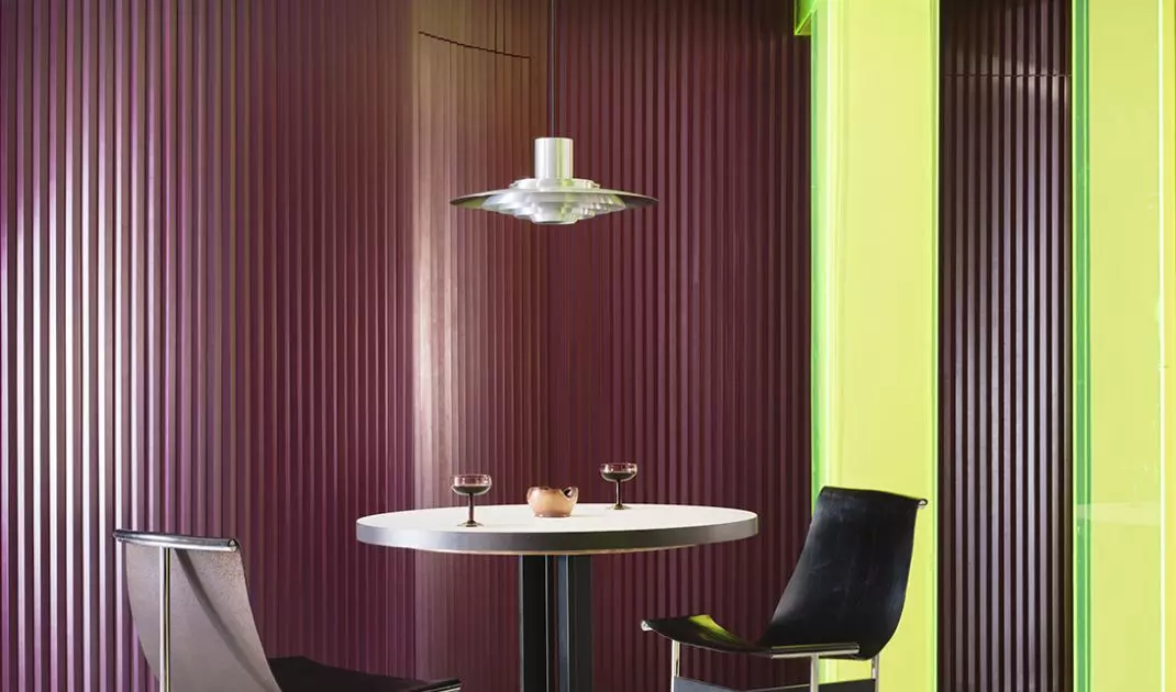 In the dining room, color, light, and neon acrylic set the stage for everyday gatherings