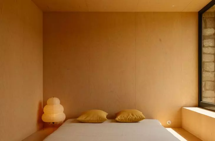 A Serene Bedroom in a House in Paarach Designed by NOKE Architects 