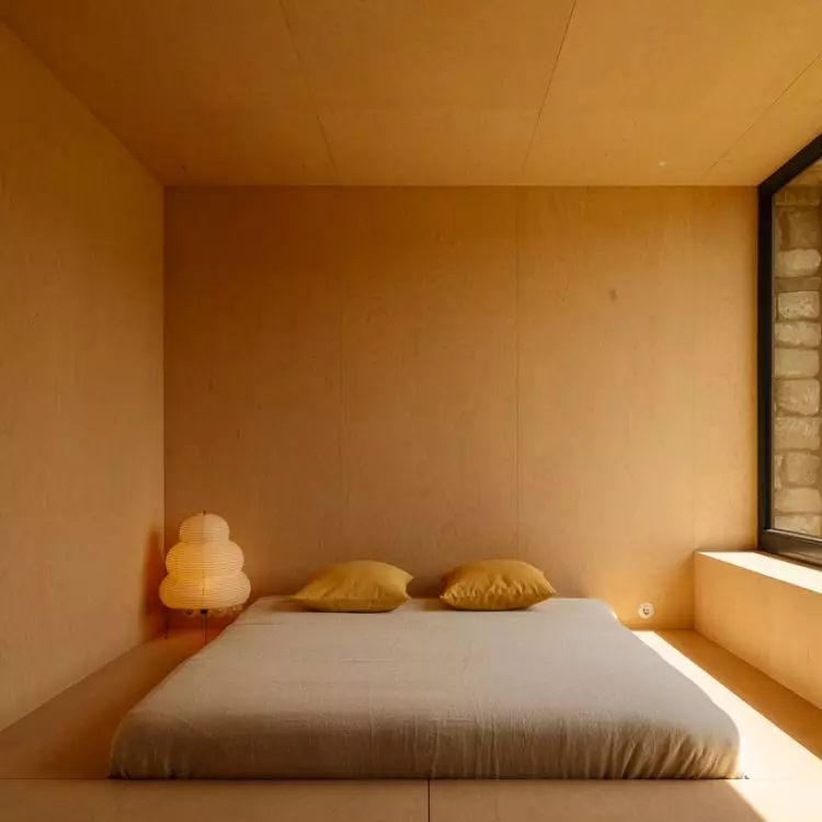 A Serene Bedroom in a House in Paarach Designed by NOKE Architects 
