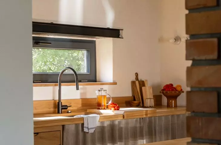 The kitchen of a house in Paary designed by NOKE Architects 