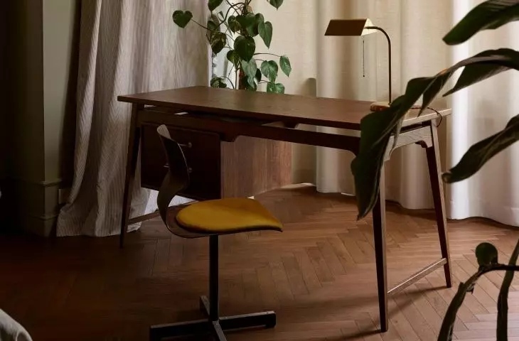 The bedroom has a spot for working or enjoying a morning cup of coffee
