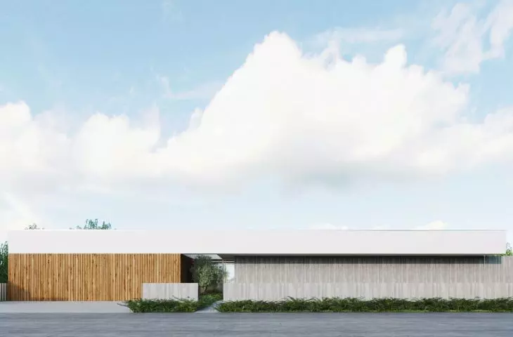 elongated, horizontal body of the house on the side of the street